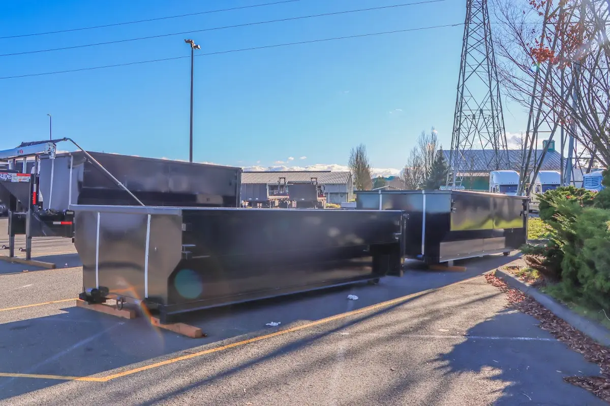 Roll-off dumpster ready for waste disposal at job site for 2 Yard Dumpster Rental in Warren